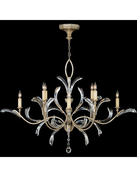 Chandelier in warm muted silver leaf finish. Features beveled crystal accents