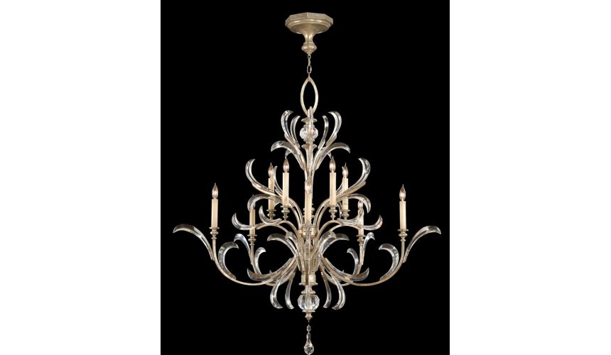 Lighting Chandelier in warm muted silver leaf finish. Features beveled crystal accents