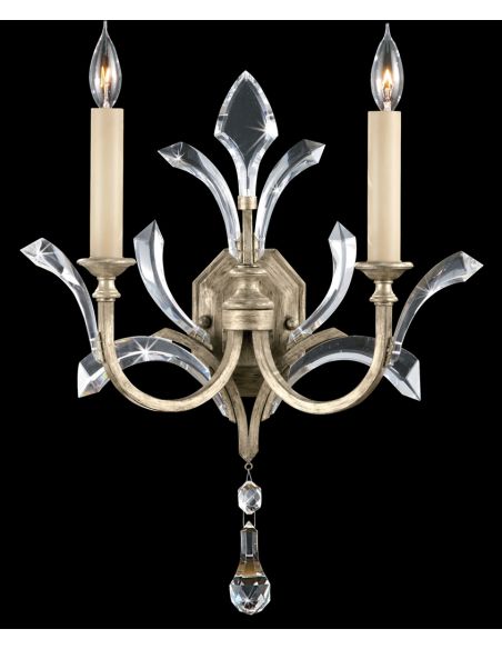 Sconce in warm muted silver leaf finish. Features beveled crystal accents