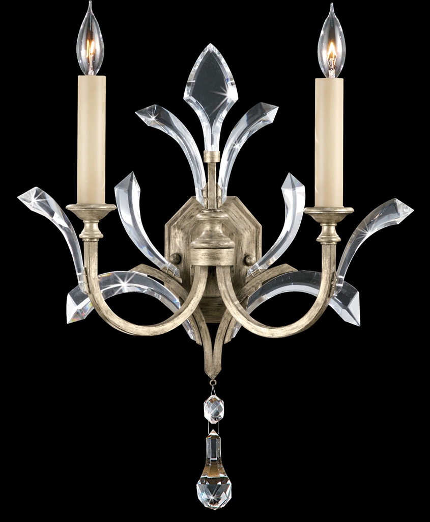 Lighting Sconce in warm muted silver leaf finish. Features beveled crystal accents