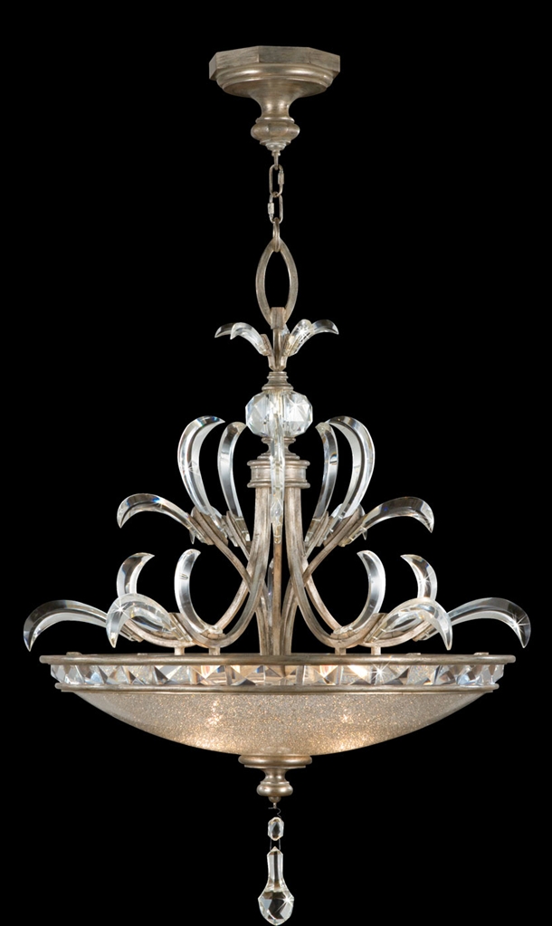 Lighting Pendant in warm muted silver leaf finish. Features beveled crystal accents