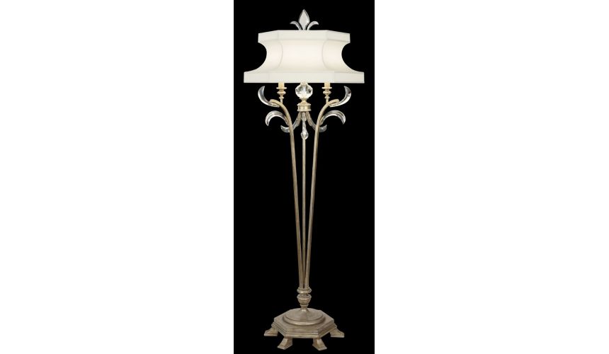 Lighting Floor lamp in warm muted silver leaf finish. Features laminated silk shantung shade