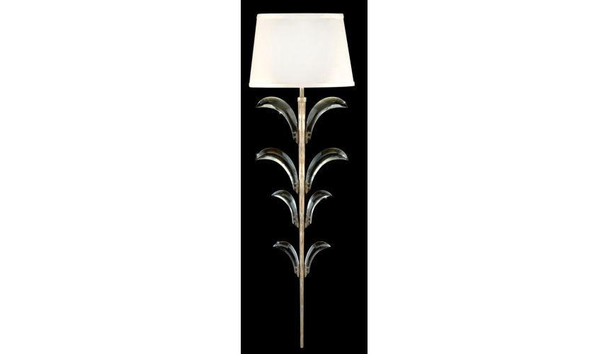 Lighting Sconce in a warm muted silver leaf finish featuring beveled crystal accents