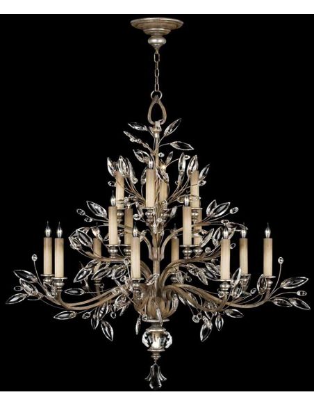 Chandelier in antiqued warm silver leaf with stylized faceted crystal leaves