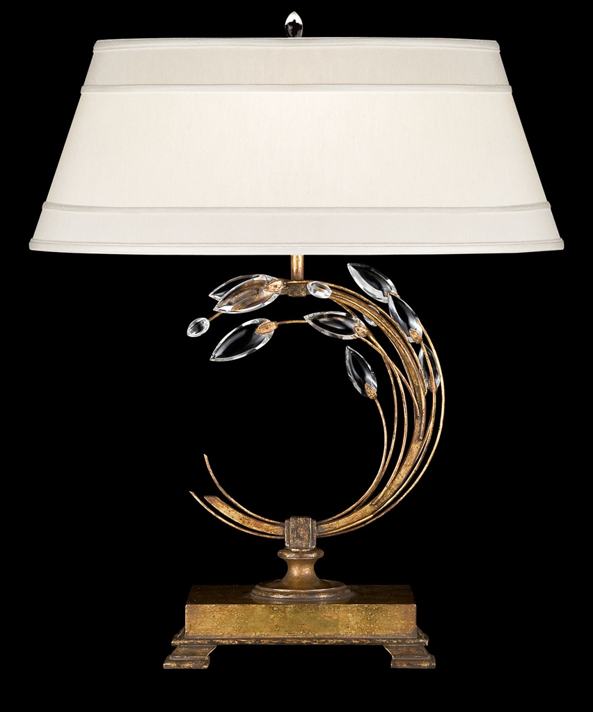 Lighting Left-side facing table lamp in gold leaf with stylized faceted crystal leaves