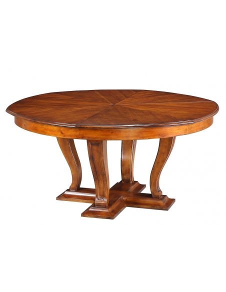 Dining Tables Transitional style round table with self storing leaves.