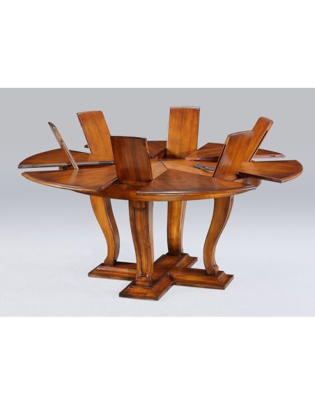 Dining Tables Transitional style round table with self storing leaves.