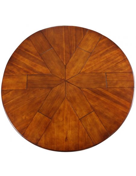 Dining Tables Transitional style round table with self storing leaves.