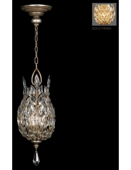 Lantern in antiqued gold leaf finish with stylized faceted crystal leaves