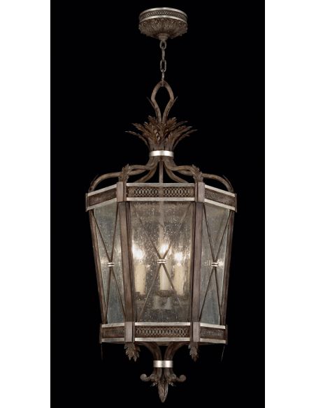 Lantern in hand painted driftwood finish on metal with silver leafed accents