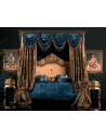 Queen and King Sized Beds Master bed with canopy and embroidered headboard.