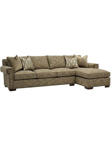 Cozy sofa with chaise lounge. High end furnishings. 7556