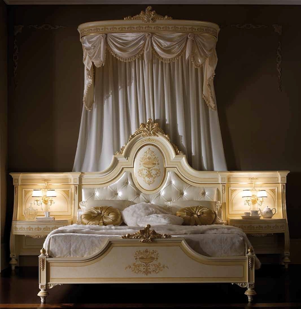 Queen and King Sized Beds Elegant master bedroom with drapery crown.