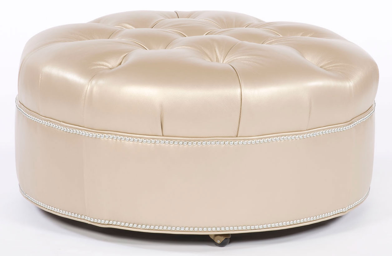 Luxury Leather & Upholstered Furniture Tufted round ottoman. Grand home furnishings. 82