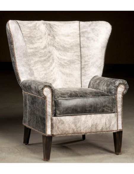 High back accent chair. Hair hide and distressed leather.