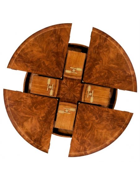 Dining Tables Jupe table with self storing leaves, center pops up. 594596