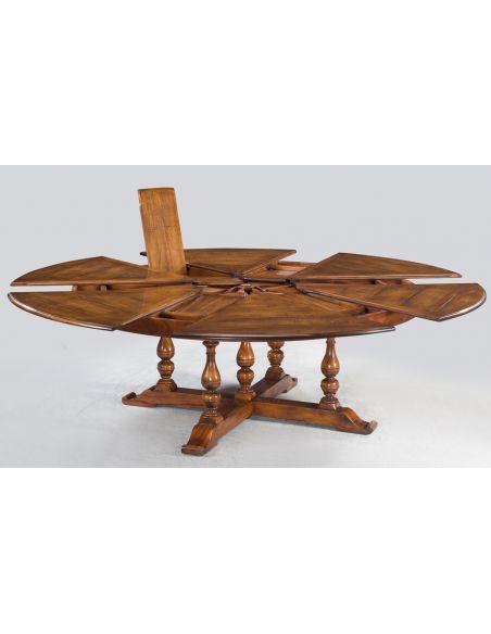 Dining Tables 24 Jupe table with self storing leaves, Oyster Veneer Inlay.