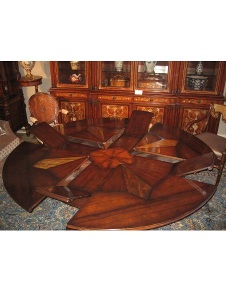 Dining Tables 22 Jupe table with self storing leaves, center pops up