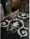 Dining Tables Fine carvings and a etched glass top highlight this dining set.