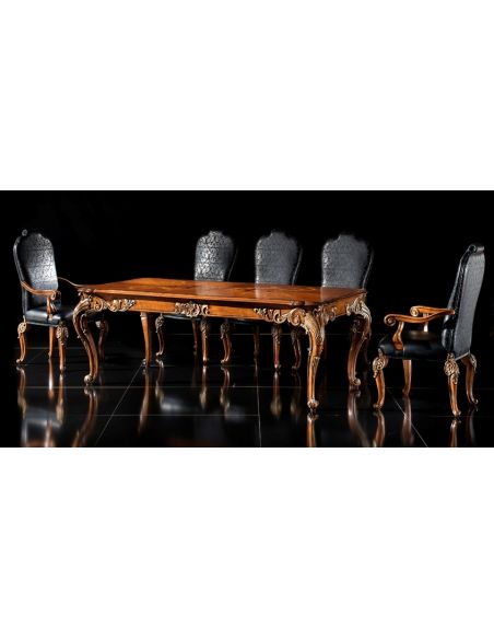 Dining Tables Fine carvings and marquetry highlight this luxury dining set.