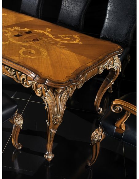 Dining Tables Fine carvings and marquetry highlight this luxury dining set.