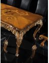 Dining Tables Fine carvings and marquetry highlight this luxury dining set.