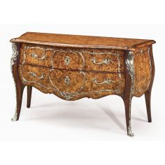 Foyer and Center Tables Luxury furniture. Burl serpentine bomb chest.