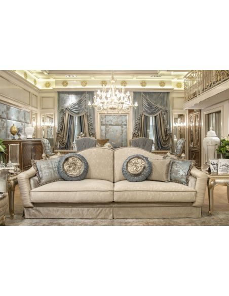 Fine fabrics highlight this extraordinary hand made luxury sofa.