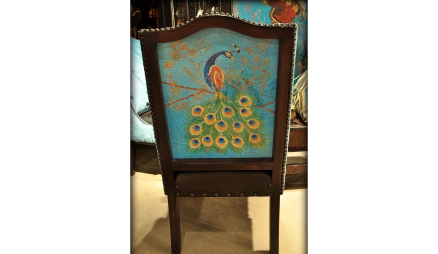 Dining Chairs Peacock chair. Real peacock feathers used in design on the outback